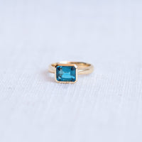Limited Edition 9K Yellow Gold Emerald Cut London Blue Topaz Ring