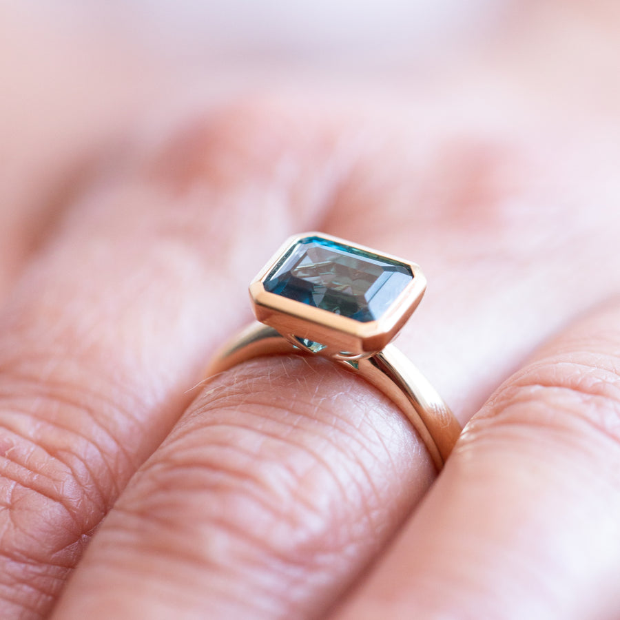 Limited Edition 9K Yellow Gold Emerald Cut London Blue Topaz Ring