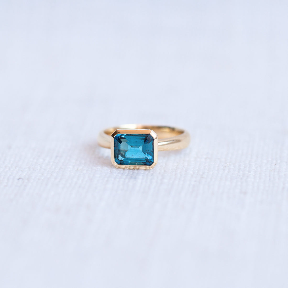Limited Edition 9K Yellow Gold Emerald Cut London Blue Topaz Ring