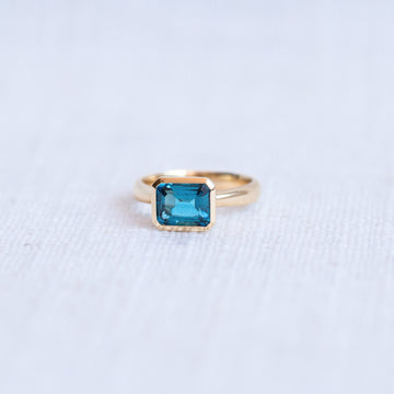 Limited Edition 9K Yellow Gold Emerald Cut London Blue Topaz Ring